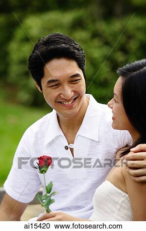 Couple looking at each other View Large Photo Image Stock Image - Couple looking at each other. Fotosearch