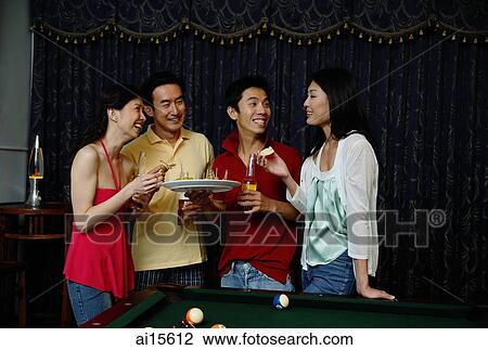 Couples eating appetizers View Large Photo Image Stock Image - Couples eating appetizers. Fotosearch