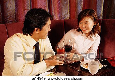 Executives toasting with drinks View Large Photo Image Stock Photo - Executives toasting with drinks. Fotosearch