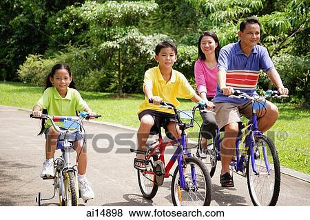 Family on bicycles, portrait View Large Photo Image Stock Photo - Family on bicycles, portrait. Fotosearch