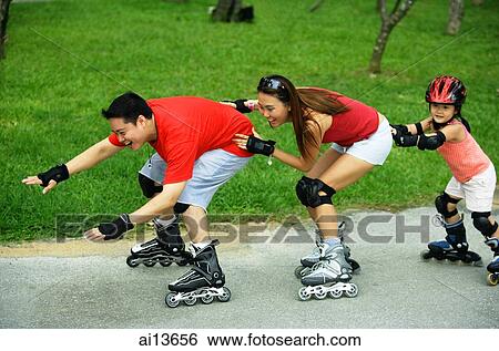 Family wearing roller blades, all in a row View Large Photo Image Stock Photograph - Family wearing roller blades, all in a row. Fotosearch