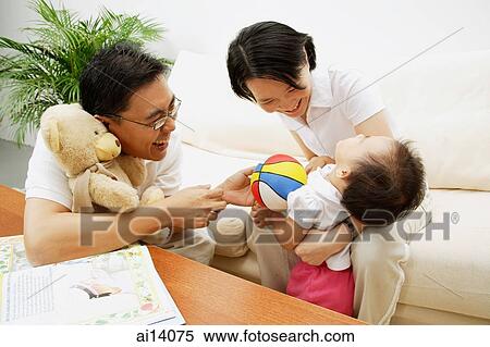 Family with one child, bonding View Large Photo Image Stock Photography - Family with one child, bonding. Fotosearch