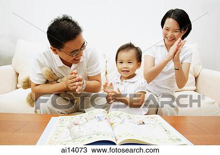Family with one child clapping View Large Photo Image Stock Image - Family with one child clapping. Fotosearch