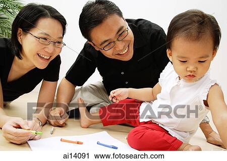 Family with one child, portrait View Large Photo Image Stock Image - Family with one child, portrait. Fotosearch