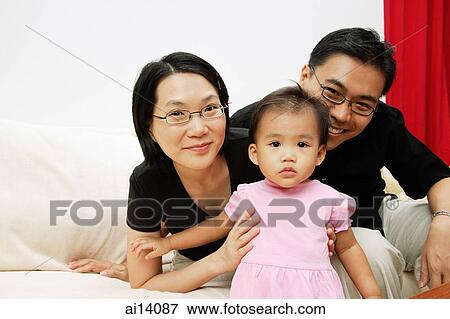 Family with one child, portrait View Large Photo Image Stock Photo - Family with one child, portrait. Fotosearch
