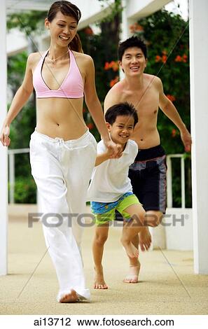 Family with one child, running View Large Photo Image Stock Image - Family with one child, running. Fotosearch