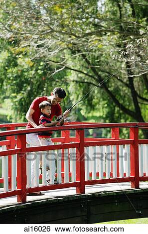 Father and son on bridge, fishing View Large Photo Image Stock Photograph - Father and son on bridge, fishing. Fotosearch