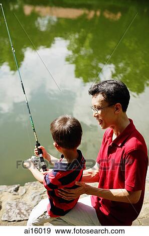 Father and young son, fishing View Large Photo Image Stock Photo - Father and young son, fishing. Fotosearch
