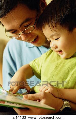 Father reading with son View Large Photo Image Stock Image - Father reading with son. Fotosearch