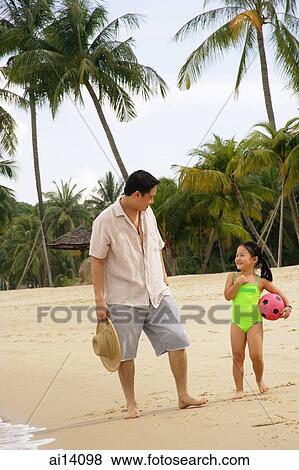 Father with daughter on beach View Large Photo Image Stock Photo - Father with daughter on beach. Fotosearch