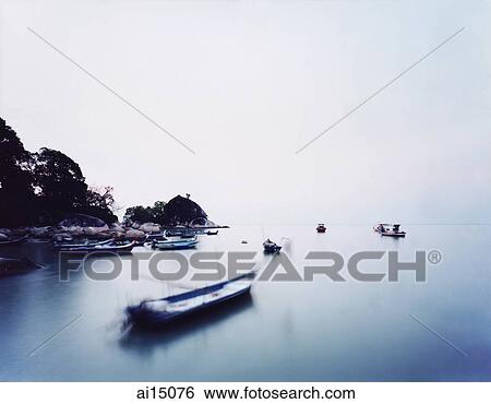 Fishing boats at sundown View Large Photo Image Stock Photograph - Fishing boats at sundown. Fotosearch