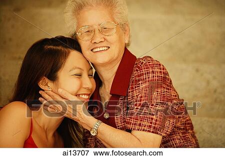 Stock Photo - Grandmother with granddaughter, portrait. Fotosearch