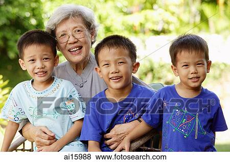Stock Photo - Grandmother with three grandsons. Fotosearch
