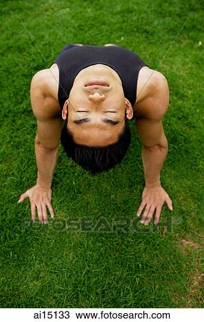Man stretching, leaning on hands View Large Photo Image Stock Image - Man stretching, leaning on hands. Fotosearch