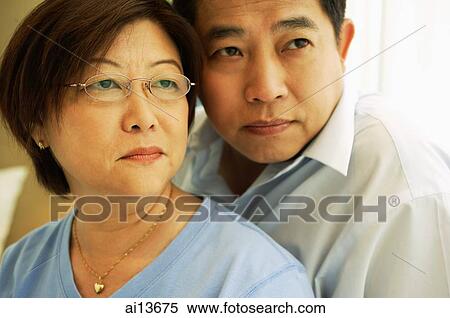 Mature couple looking away, portrait View Large Photo Image Stock Photography - Mature couple looking away, portrait. Fotosearch