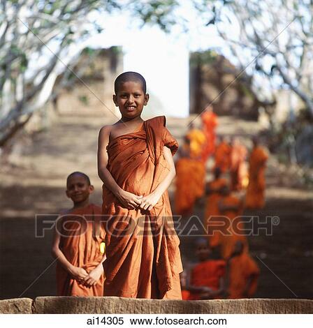 Stock Photography - Mihintale temple complex, group of young Buddhist monks walking up steps leading to temple complex. Fotosearch