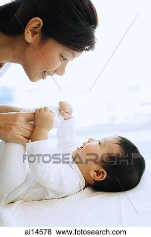 Mother and baby boy, bonding View Large Photo Image Stock Photo - Mother and baby boy, bonding. Fotosearch
