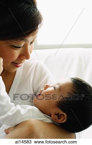 Mother with baby boy, portrait View Large Photo Image Stock Image - Mother with baby boy, portrait. Fotosearch