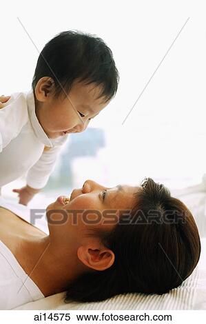Mother with baby boy View Large Photo Image Stock Photography - Mother with baby boy. Fotosearch