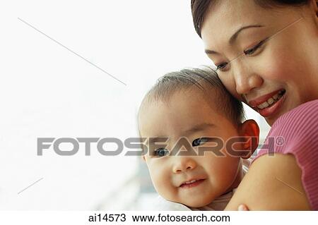 Mother with baby girl, portrait View Large Photo Image Stock Image - Mother with baby girl, portrait. Fotosearch