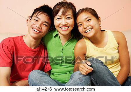 Mother with son and daughter, looking at camera, smiling View Large Photo Image Stock Photograph - Mother with son and daughter, looking at camera, smiling. Fotosearch