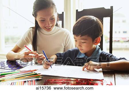Mother with son, drawing with colour pencils View Large Photo Image Stock Photograph - Mother with son, drawing with colour pencils. Fotosearch