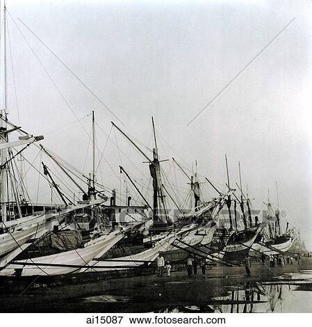 Stock Photo - Phinisi schooners in harbour. Fotosearch