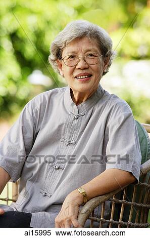 Portrait of senior woman, smiling at camera View Large Photo Image Stock Photography - Portrait of senior woman, smiling at camera. Fotosearch