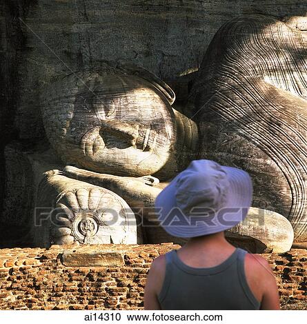 Sri Lanka, Polonnaruwa ancient city, Gal Vihara Statue, tourist in foreground View Large Photo Image Stock Image - Sri Lanka, Polonnaruwa ancient city, Gal Vihara Statue, tourist in foreground. Fotosearch