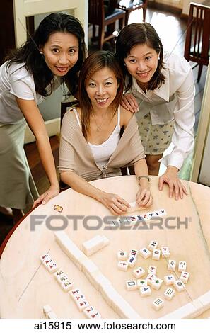 Women around mahjong table, looking at camera, high angle view View Large Photo Image Stock Photography - Women around mahjong table, looking at camera, high angle view. Fotosearch