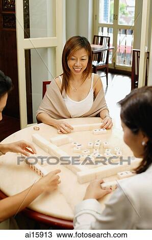 Women playing mahjong, high angle view View Large Photo Image Stock Image - Women playing mahjong, high angle view. Fotosearch