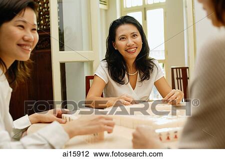 Women playing mahjong, selective focus View Large Photo Image Stock Image - Women playing mahjong, selective focus. Fotosearch