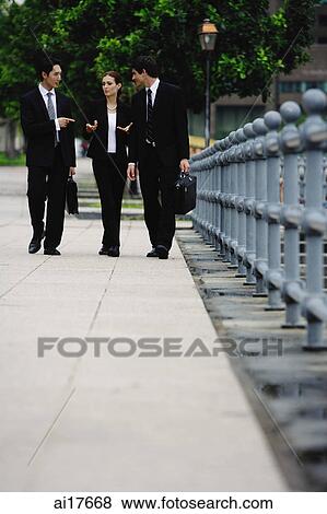 Business people walking View Large Photo Image Stock Photo - Business people walking . Fotosearch