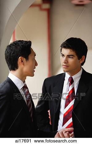 Businessmen talking View Large Photo Image Stock Image - Businessmen talking . Fotosearch