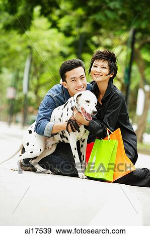 Couple embracing Dalmatian View Large Photo Image Stock Photo - Couple embracing Dalmatian . Fotosearch