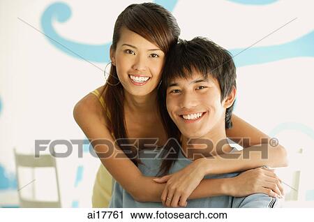 Couple smiling at camera View Large Photo Image Stock Image - Couple smiling at camera . Fotosearch