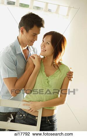 Couple standing together View Large Photo Image Stock Image - Couple standing together . Fotosearch