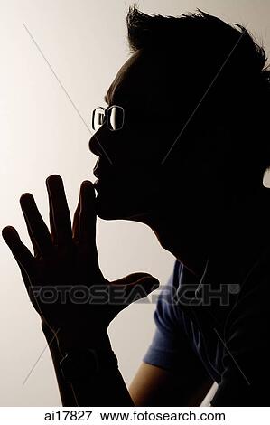 Man in profile, hand on chin View Large Photo Image Stock Photo - Man in profile, hand on chin . Fotosearch