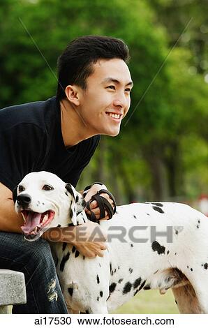 Stock Image - Man with Dalmatian. Fotosearch