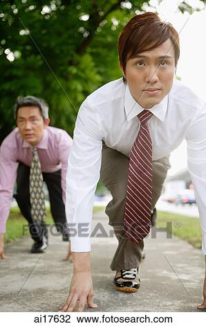Two businessmen in runners starting position View Large Photo Image Stock Image - Two businessmen in runners starting position . Fotosearch