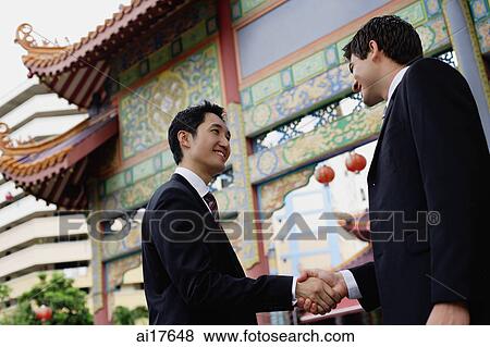 Two businessmen shaking hands View Large Photo Image Stock Photo - Two businessmen shaking hands . Fotosearch