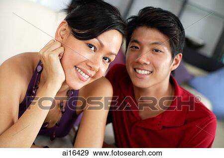 Couple smiling at camera View Large Photo Image Stock Photo - Couple smiling at camera. Fotosearch