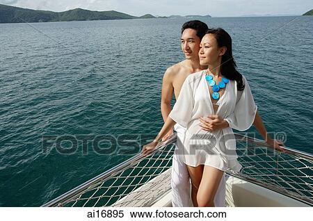 Couple standing on yacht, portrait View Large Photo Image Stock Photography - Couple standing on yacht, portrait . Fotosearch