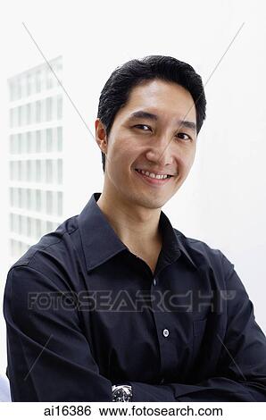 Man smiling at camera View Large Photo Image Stock Photograph - Man smiling at camera . Fotosearch
