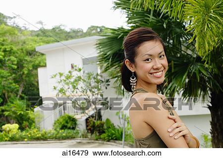 Woman looking at camera, smiling, portrait View Large Photo Image Stock Photo - Woman looking at camera, smiling, portrait . Fotosearch