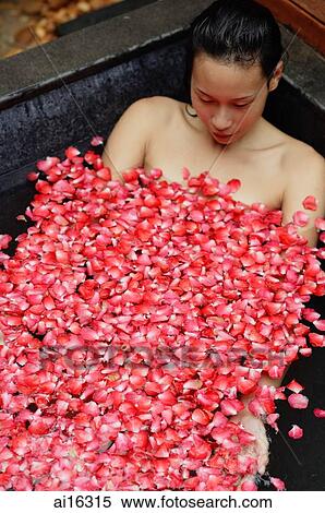 Woman relaxing in tub, eyes closed View Large Photo Image Stock Photography - Woman relaxing in tub, eyes closed. Fotosearch
