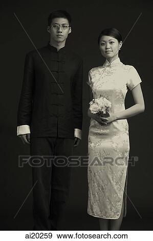 Stock Photo - Black and white image of couple in traditional Chinese attire. Fotosearch