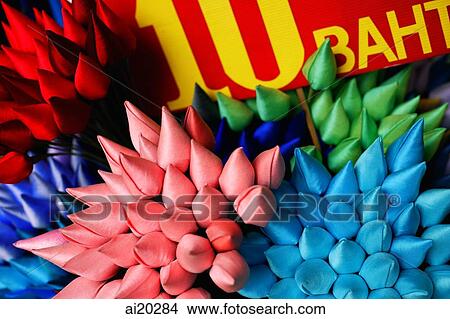Picture - Handmade silk flowers with price sign of ten Baht ( Thai currency). Fotosearch