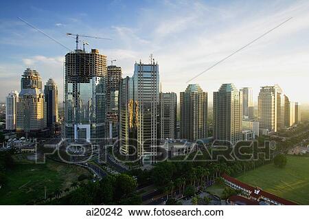 Late afternoon view of office buildings and construction along Jalan Jend Sudirman, Jakarta View Large Photo Image Stock Image - Late afternoon view of office buildings and construction along Jalan Jend Sudirman, Jakarta. Fotosearch