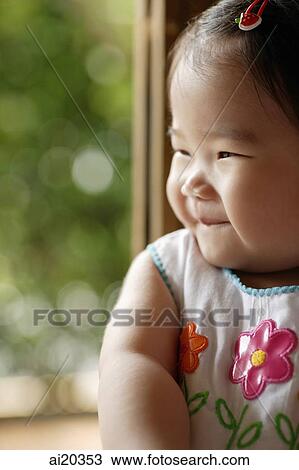 Portrait of baby girl, smiling View Large Photo Image Stock Image - Portrait of baby girl, smiling. Fotosearch